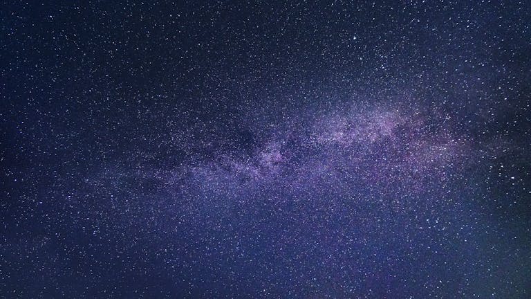A breathtaking photo of the Milky Way galaxy captured on a clear night sky, showcasing the beauty of the cosmos.